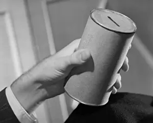 Man holding collection jar