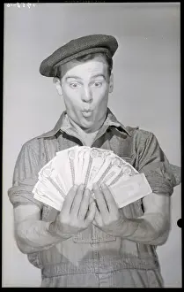 Exaggeration Prints: Man Holding Fan of Money