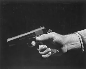 Images Dated 28th February 2008: Man holding gun, close up of hand