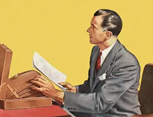 Man Holding Papers