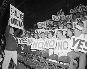 Choice Prints: Man Holding Sign near Grandstand Audience