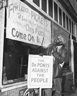 Picketing Prints: Man Holds Anti-Dupont Sign Before Diner