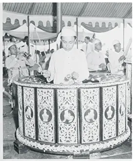 Bangkok Prints: Man Inside Large Musical Creation