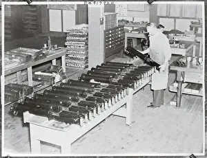 New South Wales Prints: Man Inspecting Machine Guns
