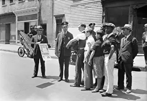 Public Health Prints: Man Inspecting Pedestrians for Vaccinations