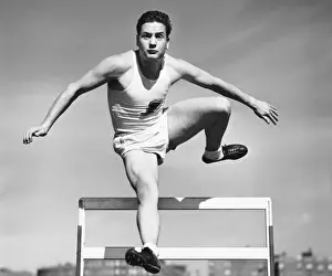 Decathlon Prints: Man jumping over hurdle