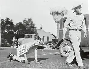 Phoenix Prints: Man on a Leash After Losing Election Bet