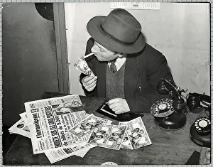 Economics Prints: Man Lighting His Cigarette with Currency