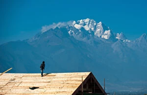 Lijiang Gallery: Man looking at mountain