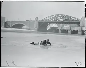 Man Lying on Icy River