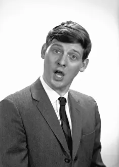 Raised Eyebrow Prints: Man making face in studio, (B&W), portrait