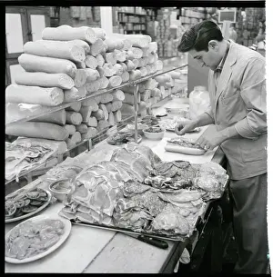 Cheese Prints: Man Making Sandwich With Piles Of Meat
