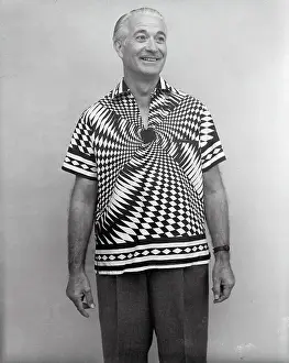 Man Modeling a Sports Shirt with an Optical Illusion Pattern