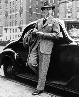 Stylish Prints: Man Modeling Wool Tweed Suit
