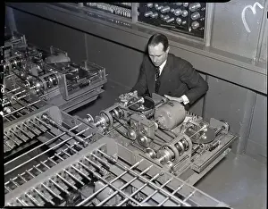 Computer Prints: Man Operates Computer Controls