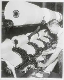 North Carolina Prints: Man Operating a Comber