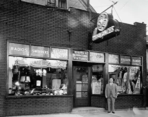 Huty37475 Prints: Man Outside Appliances Shop