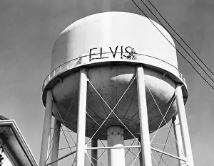 Minnesota Prints: Man Painting Elvis On Water Tower