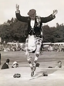 Man Performing Sword Dance