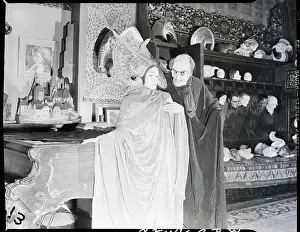 Benda Prints: Man in Pestilence Mask with Woman as Goddess