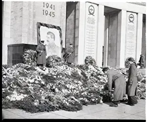 Mourner Prints: Man Places Wreath at Base of Stalin Memo
