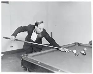Man Playing Billiards