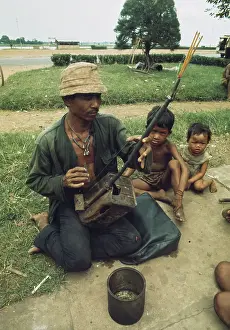 Huty31503 Prints: Man Playing Instrument In Phnom Penh