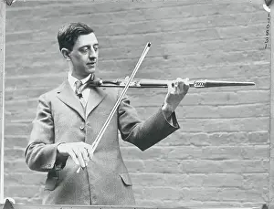 Man Playing Unique Instrument