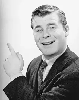 Index Finger Prints: Man pointing with forefinger in studio, (B&W), close-up, portrait