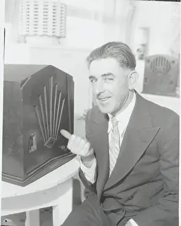 George Allen Prints: Man Pointing to Radio