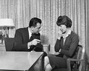Necktie Prints: Man pointing and talking to upset woman