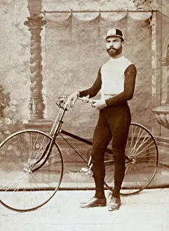 Man Posing with Bicycle