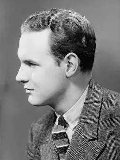 Sleek Hair Prints: Man posing in studio, (B&W), close-up, portrait