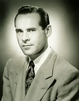 40 45 Years Prints: Serious man posing in studio, (B&W), (Close-up), (Portrait)