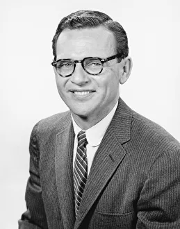 35 39 Years Collection: Man posing in studio, (B&W), portrait