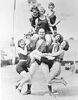 Man Posing with Several Women