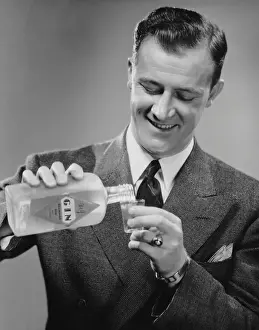 Man pouring a drink