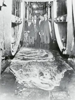 Man Pouring Wine into Sewer