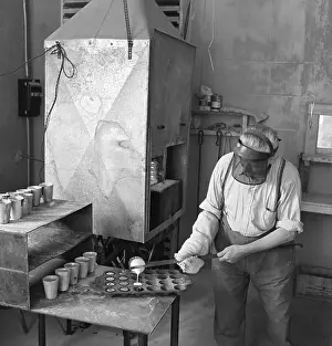 Lead Prints: Man Pours Molten Metal To Cool Off