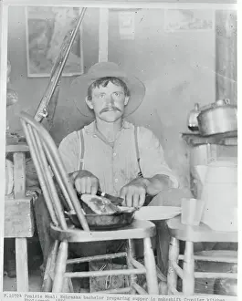 Nebraska Prints: Man Preparing Dinner