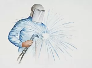 Images Dated 23rd May 2006: Man in protective gear using a welding machine