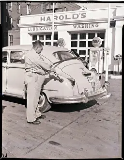 Gas Station Prints: Man Putting Gas in Automobile