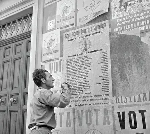 San Marino Prints: Man Putting up Political Posters in San Marino