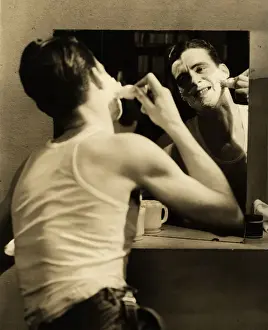 Man putting on shaving cream