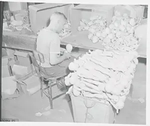 Repetition Prints: Man Putting Toys Together