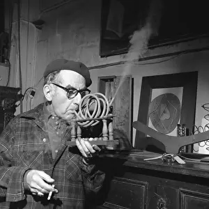 Tubing Prints: Man Ray Demonstrating His Piece Smoking Device
