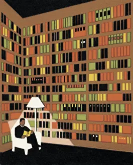 Man Reading in a Library