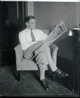 Man Reading the Newspaper