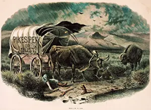 Man Resting on Pikes Peak with his Wagon