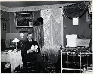 Nome Prints: Man Seated in Bedroom Reading